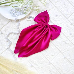 Magenta pink tail hair bow